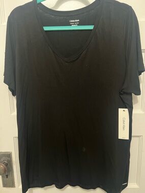 size 1X Calvin Klein liquid jersey top.